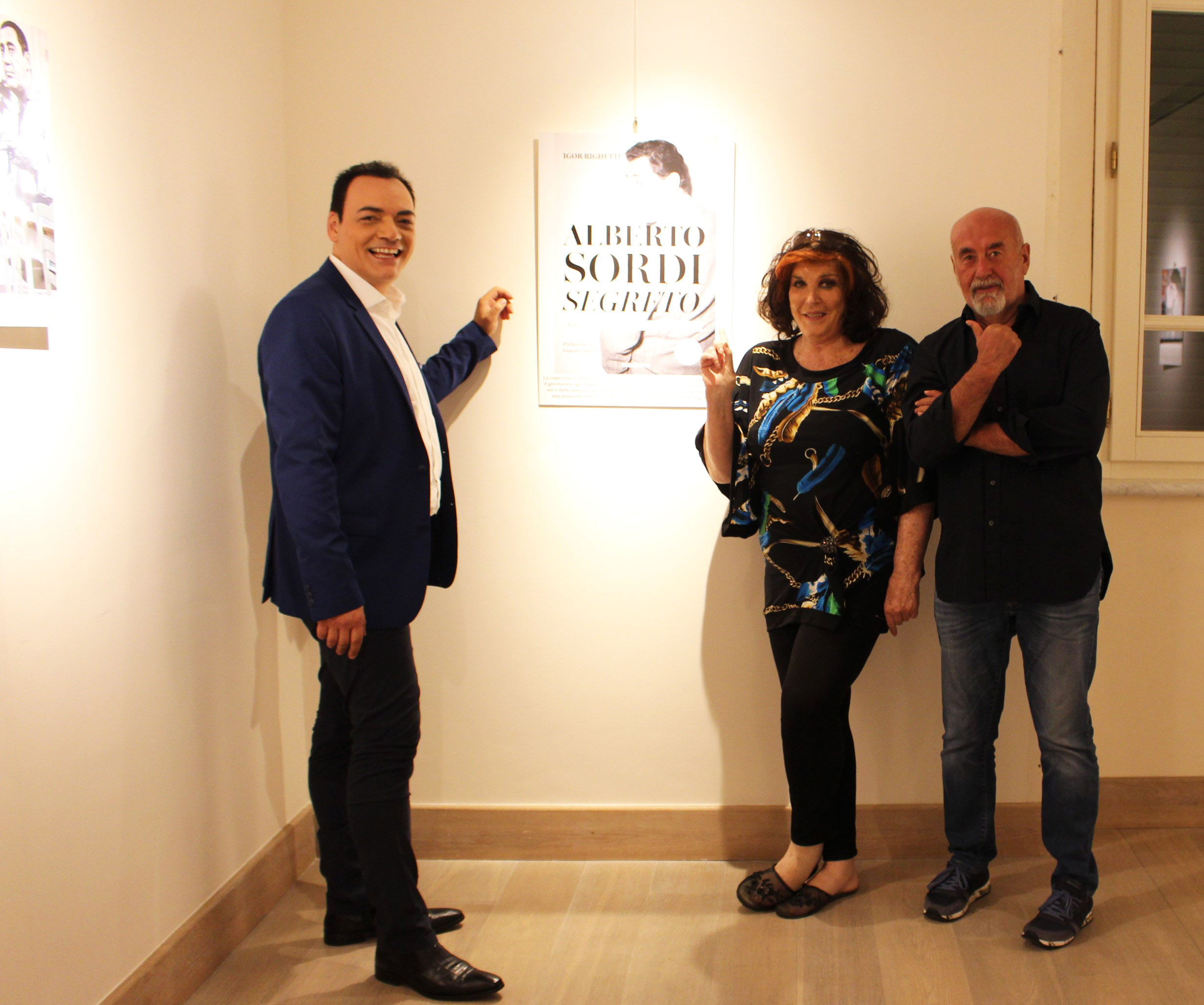 Igor Righetti con la contessa Patrizia de Blanck e lo scrittore Lorenzo Beccati