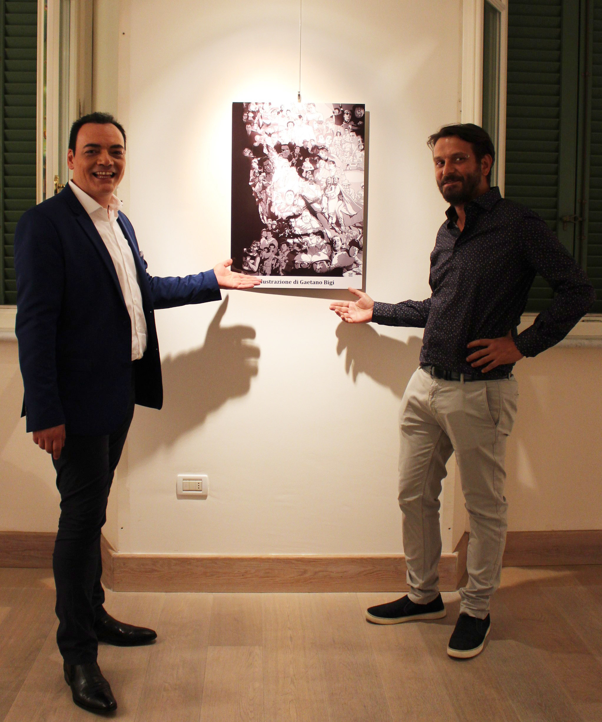 Igor Righetti con l’illustratore Gaetano Bigi, autore del manifesto della mostra e dello spettacolo dedicati ad Alberto Sordi